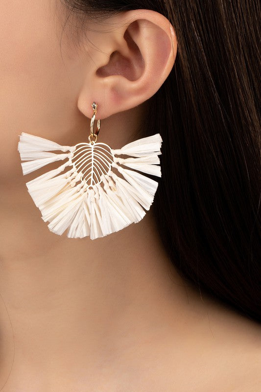 Statement earrings with raffia straw leaf drop